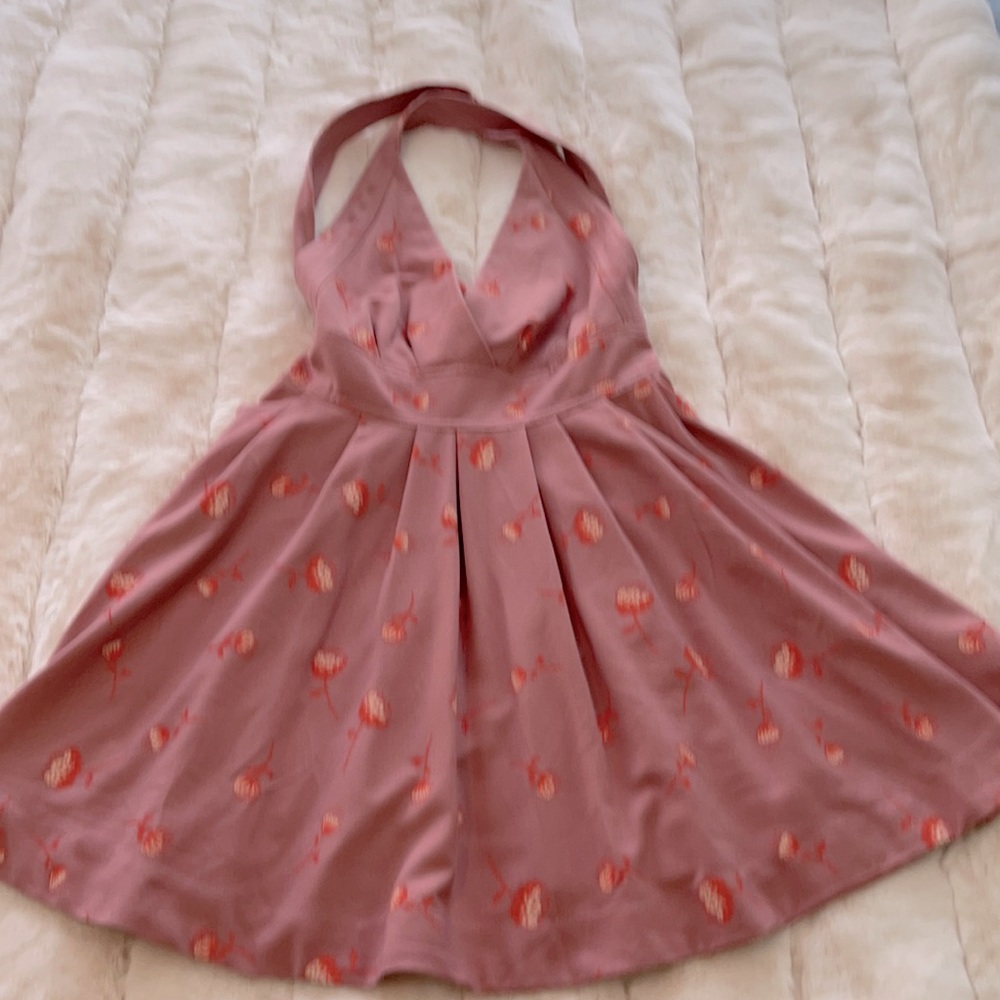 Free people halter style dress. Never worn.   Strappy back
